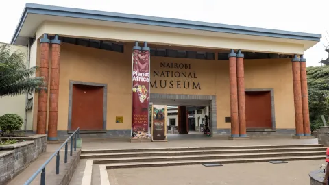 A wide portico on brick columns carries the name of the Nairobi National Museum.